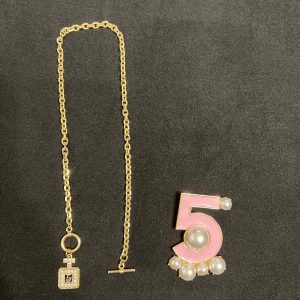 Perfume bottle necklace and Brooche set